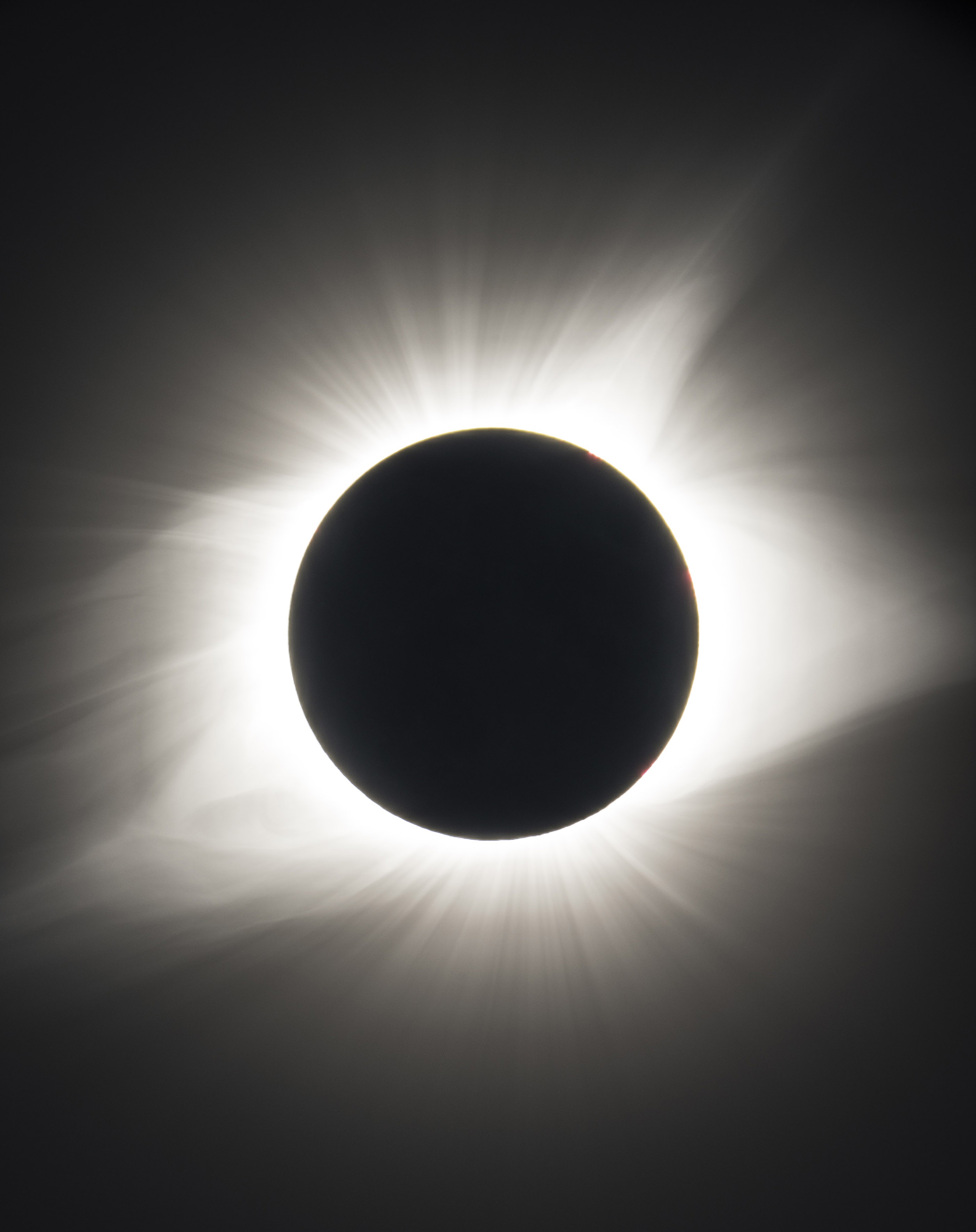 Solar eclipse above festival stage